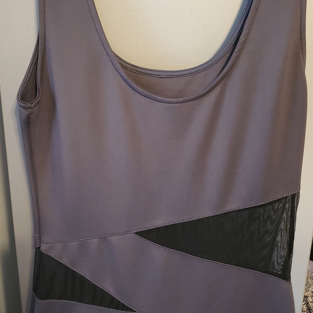 Grey mini dress with sheer black mesh cut outs at the waist. Sz M. Worn once.